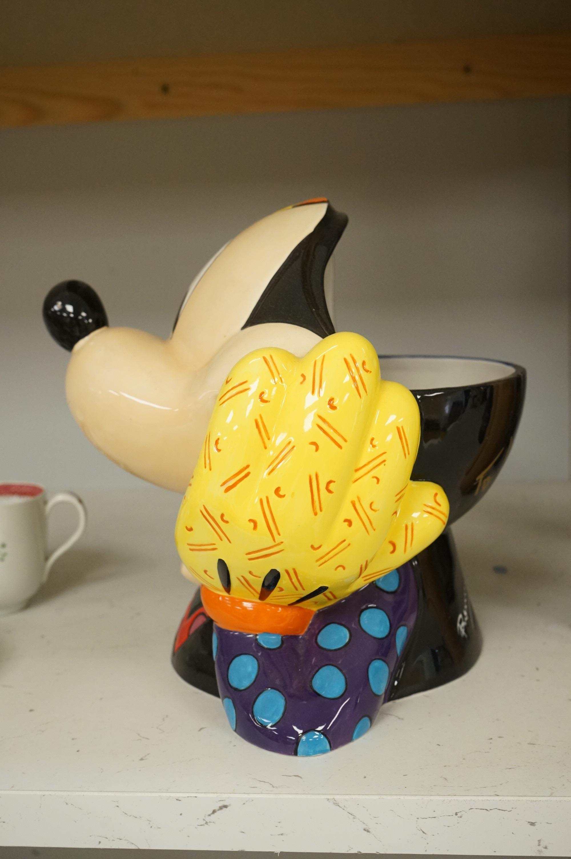 Romero Brotto (Brazilian, 1963-), a ceramic Mickey Mouse cookie jar with booklet, lacking cover, 21cm high